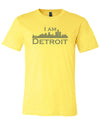 Yellow short sleeve t-shirt with large gray I Am Detroit logo printed across the chest