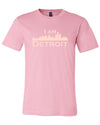 Pink short sleeve t-shirt with large peach I Am Detroit logo printed across the chest