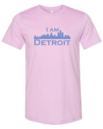 Lilac colored short sleeve t-shirt with large purple I Am Detroit logo printed across the chest