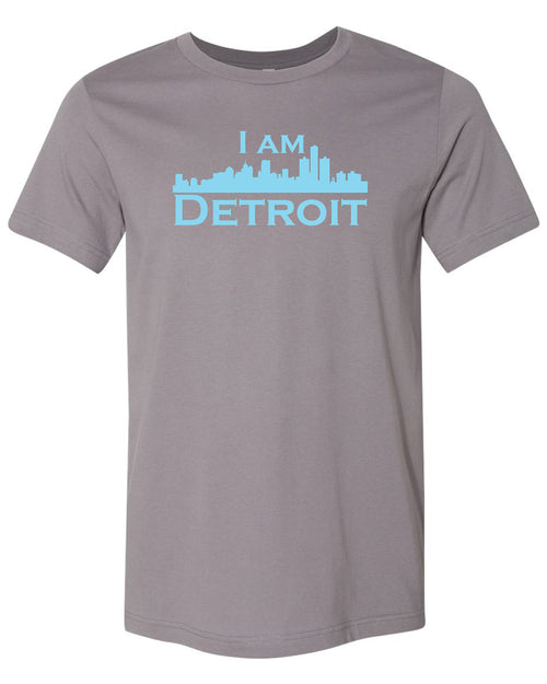 Storm gray colored short sleeve t-shirt with large teal I Am Detroit logo printed across the chest