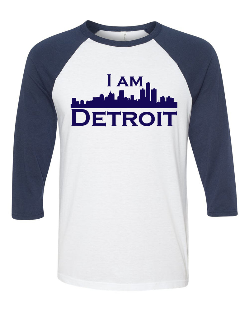 white raglan jersey with navy 3/4 sleeves and navy I Am Detroit logo across the front of t-shirt